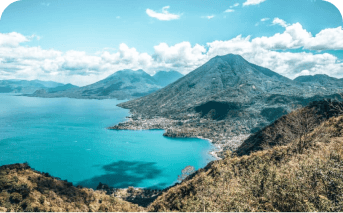 A beautiful lake surrounded by three volcanoes. Lake Atitlán is a popular destination for hiking, swimming, and kayaking.